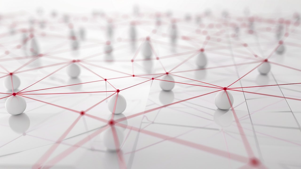 Mit roten Linien verbundene weiße Kugeln. Sinnbildliche Darstellung von Netzwerken. 